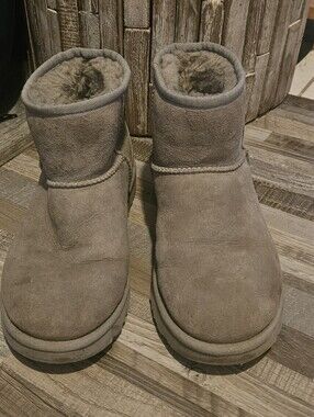 Taupe UGG Classic Mini II boots. 8